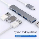 USB 3.0 Hub 5-in-1 adapter showing SD card slots and ports