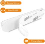 White Silicone Cable Holder with 7 slots organizing USB cords on a wooden desk