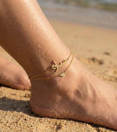 Copper ankle bracelet featuring the name Sara in Arabic calligraphy