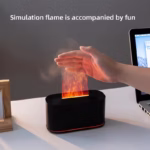 Flame Diffuser Humidifier emitting mist with a realistic LED fire effect on a bedside table