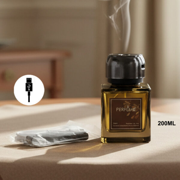 Luxury 200ml transparent reed diffuser bottle with black reeds on a modern table.