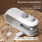 Handheld white mini bag sealer with USB-C port sealing a plastic potato chip bag.