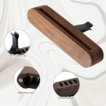 Round wooden car essential oil diffuser with magnetic lid and silicone-protected vent clip.