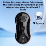 White X3 window cleaning robot with dual water spray nozzles cleaning a large glass pane.