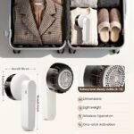 Handheld electric fabric shaver with six stainless steel blades and ergonomic grip for lint removal.