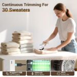 Handheld electric fabric shaver with six stainless steel blades and ergonomic grip for lint removal.