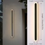 100cm long black minimalist LED wall light with 3000K warm white glow