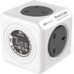 Smart energy monitor plug featuring E-ink screen showing monetary cost and touch power switch.