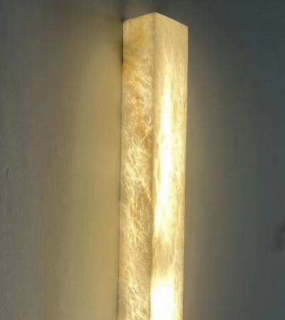Lelantos waterproof LED wall light with iron finish and copper accents mounted on a modern wall.
