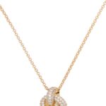 Close-up of Kate Spade Double Knot Pave Pendant with cubic zirconia stones