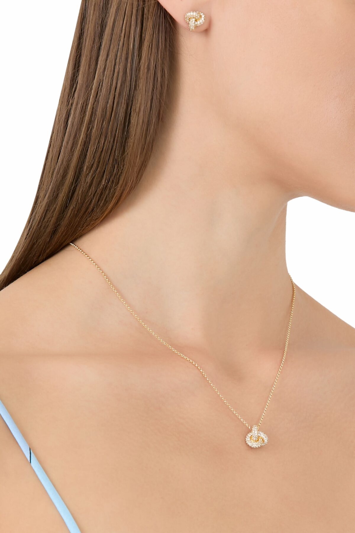 Close-up of Kate Spade Double Knot Pave Pendant with cubic zirconia stones