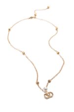 The Valentino Garavani VLogo Signature necklace featuring a pearl and Swarovski crystal pendant on a gold-tone chain.