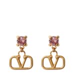 Close-up of Valentino Garavani VLogo earrings in gold-tone metal with rhinestones