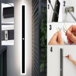 Long minimalist black LED wall light with acrylic enclosure on a modern exterior wall