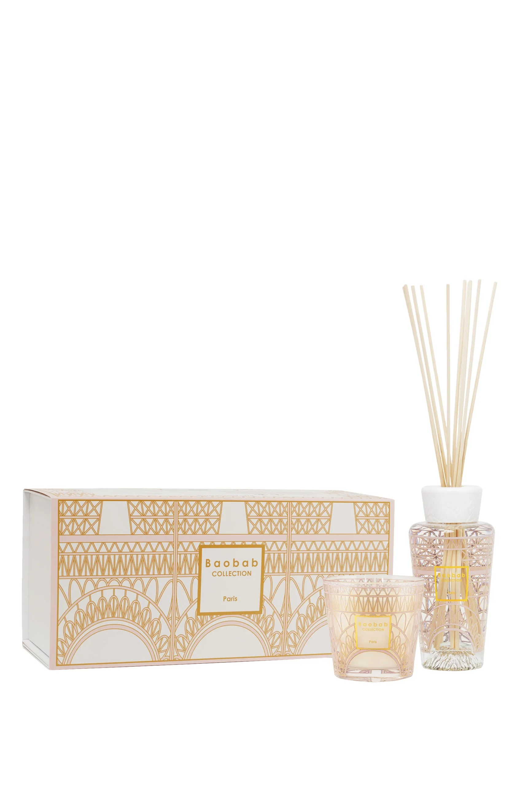 Baobab-Collection-My-First-Baobab-Gift-Box-Paris-250ml-Diffuser-And-190g-Candle The Paris scented candle and fragrance diffuser are decorated with a powder pink and gold silk-screen print depicting the base of the Eiffel Tower's stylized structure.