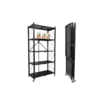 Five-tier black metal storage rack with wheels and cross-braced back standing in a modern kitchen.
