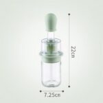 2-in-1 glass oil dispenser bottle with blue silicone brush and dropper