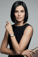 A close-up of Emporio Armani Mia 32mm watch with leather strap and stainless steel case