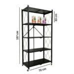 Five-tier black metal storage rack with wheels and cross-braced back standing in a modern kitchen.