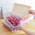 Rectangular transparent plastic food storage box with white lid for fridge organization