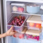Rectangular transparent plastic food storage box with white lid for fridge organization