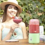 Green InnovaGoods Blendyr portable cup blender with 6 steel blades and USB charging