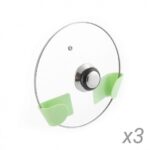 Set of three green and grey adhesive holders for saucepan lids