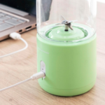 Green InnovaGoods Blendyr portable cup blender with 6 steel blades and USB charging