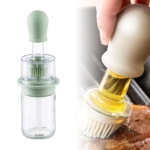 2-in-1 glass oil dispenser bottle with blue silicone brush and dropper