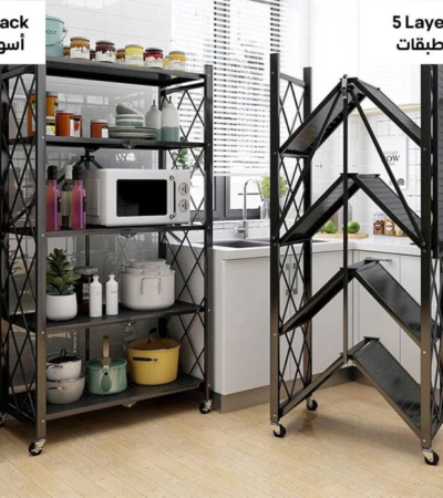 Five-tier black metal storage rack with wheels and cross-braced back standing in a modern kitchen.