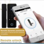 Smart glass door lock with fingerprint scanner and glowing keypad on a frameless glass door