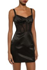 Designer short necklace by Dolce & Gabbana featuring gold finish and multiple DG logo charms. Perfect for fashion-forward luxury jewelry enthusiasts.