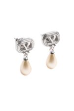 Designer earrings by Valentino Garavani featuring teardrop pearls in a silver setting. Perfect for sophisticated styling and gifting.
