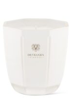 Dr. Vranjes Ginger Lime scented candle in an iridescent pearl handblown glass vessel