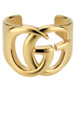 Gucci GG Marmont Cuff Bracelet in polished brass featuring the Double G logo.