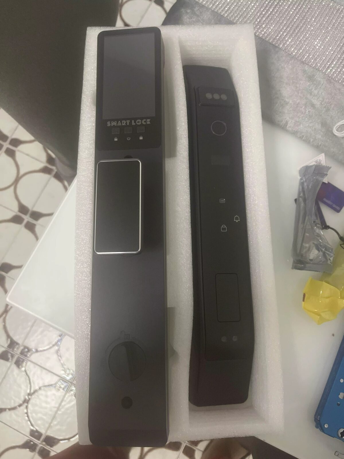 smart door lock featuring 3D face recognition, fingerprint sensor, and built-in camera.