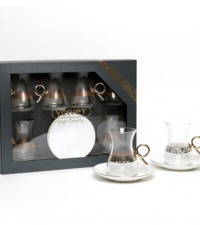 Set of 6 elegant tea cups and 6 saucers on a table