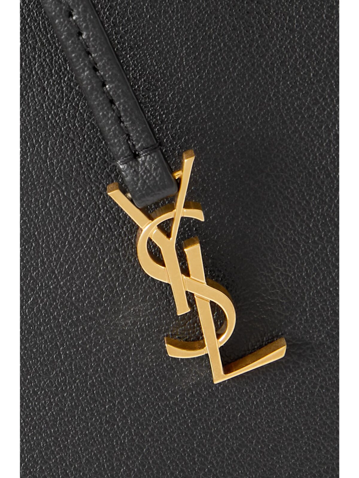 Saint Laurent East/West black leather tote bag with gold YSL charm and detachable pouch.