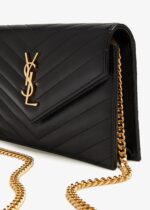 Front view of Saint Laurent Monogram Chain Wallet in black leather with a gold YSL logo.
