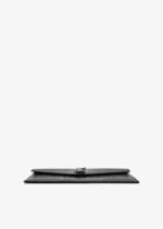 Front view of YSL Uptown Pouch in black crocodile-embossed leather with silver YSL initials