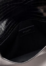 Front view of YSL Uptown Pouch in black crocodile-embossed leather with silver YSL initials