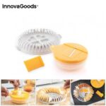 Orange and grey microwave chip maker tray with sliced potatoes and mandolin