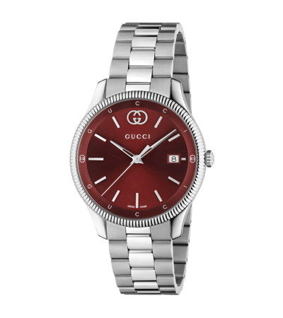 Gucci G-Timeless 38mm watch with burgundy dial and stainless steel bracelet