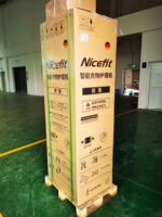 Freestanding smart clothing care wardrobe with digital touch interface.