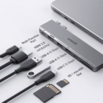 Anker 547 7-in-2 USB-C hub in silver plugged into a MacBook Pro.