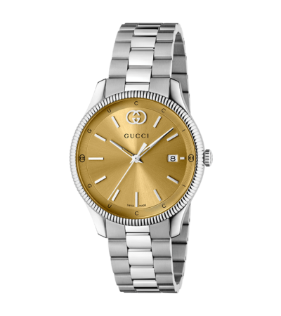 Gucci G-Timeless 38mm watch with sunray gold dial and bee motifs in stainless steel