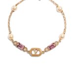 Valentino Garavani Ovalette bracelet in gold-finish metal with pearls and Swarovski crystals.