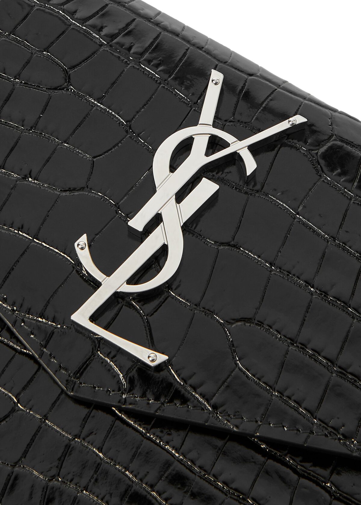 Front view of YSL Uptown Pouch in black crocodile-embossed leather with silver YSL initials