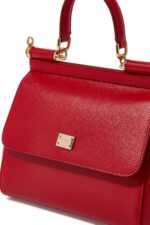 Small red Dolce & Gabbana Miss Sicily bag in textured Dauphine leather with gold hardware.