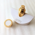 Elegant white bottle of Bvlgari Splendida Patchouli Tentation Eau de Parfum